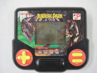 Working Electronic Handheld Tiger Jurassic Park Game 1988