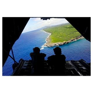 Loadmasters look out over Tumon Bay from a C 130 H Poster