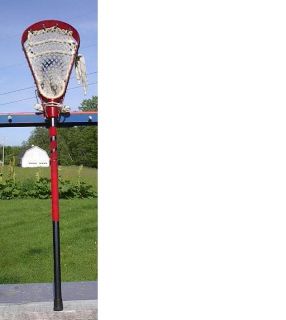 lacrosse stick. Measures 35 long. Signed BRINE. The lacrosse stick