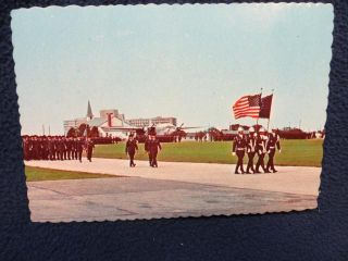 Lackland AFB. San Antonio, Texas. Trainees march past reviewing stand