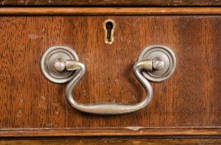 These swan neck pulls adorn the drawer fronts.