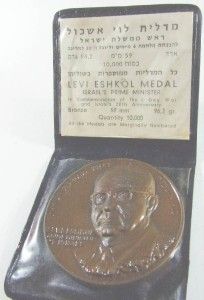 the medal obverse portrait of levi eshkol and inscriptionin hebrew and
