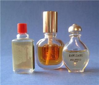 Three miniature perfume bottles Shalimar Guerlain, Marcel Rochas