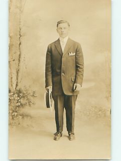 Pre 1920s RPPC Man Holds His Hat at Side at Studio in Pennsylvania PA