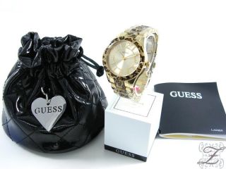 NEU Guess Damenuhr Leoparden Uhr PVD vergoldet Armband W0014L2 Damen