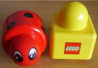 605) Lego Duplo Primo Stein gelb + Rassel Marienkäfer